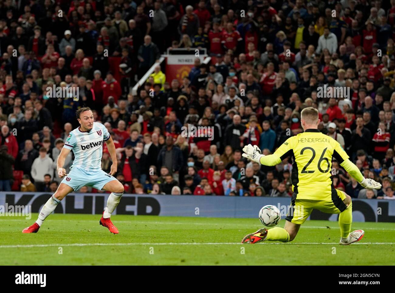 Manchester, England, 22nd September 2021. Dean Henderson of Manchester United saves from Mark Noble of West Ham United  during the Carabao Cup match at Old Trafford, Manchester. Picture credit should read: Andrew Yates / Sportimage Credit: Sportimage/Alamy Live News Stock Photo