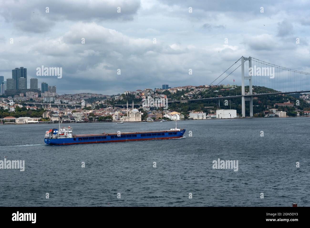 Istanbul, Turkey. September 21st 2021 A commercial container ship heading towards the Black Sea along the Bosphorus straight dividing European and Asi Stock Photo