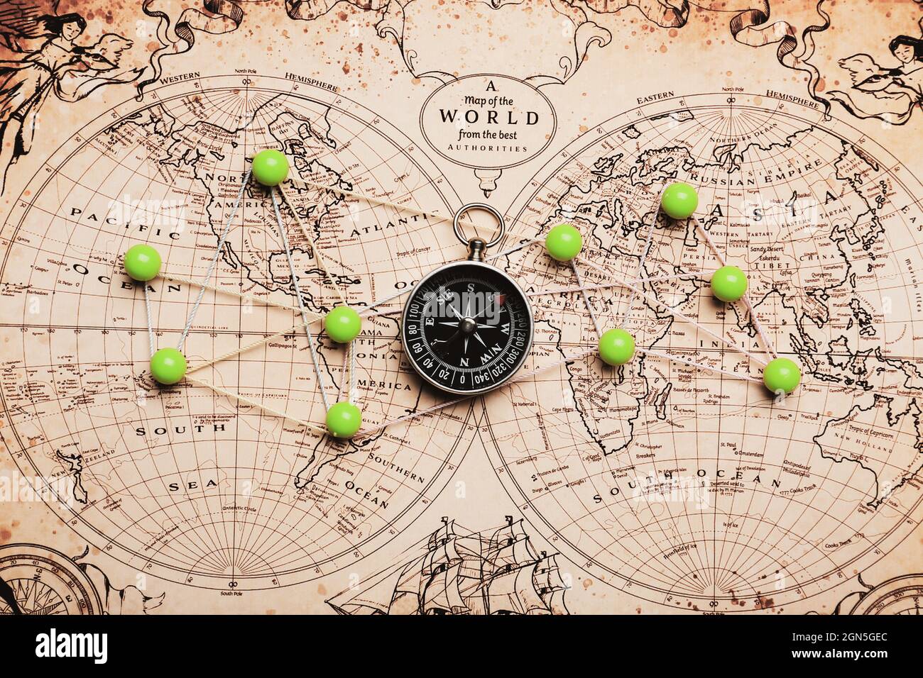 Compass and Chess on old map Stock Photo by ©kwanchaidp 75914739