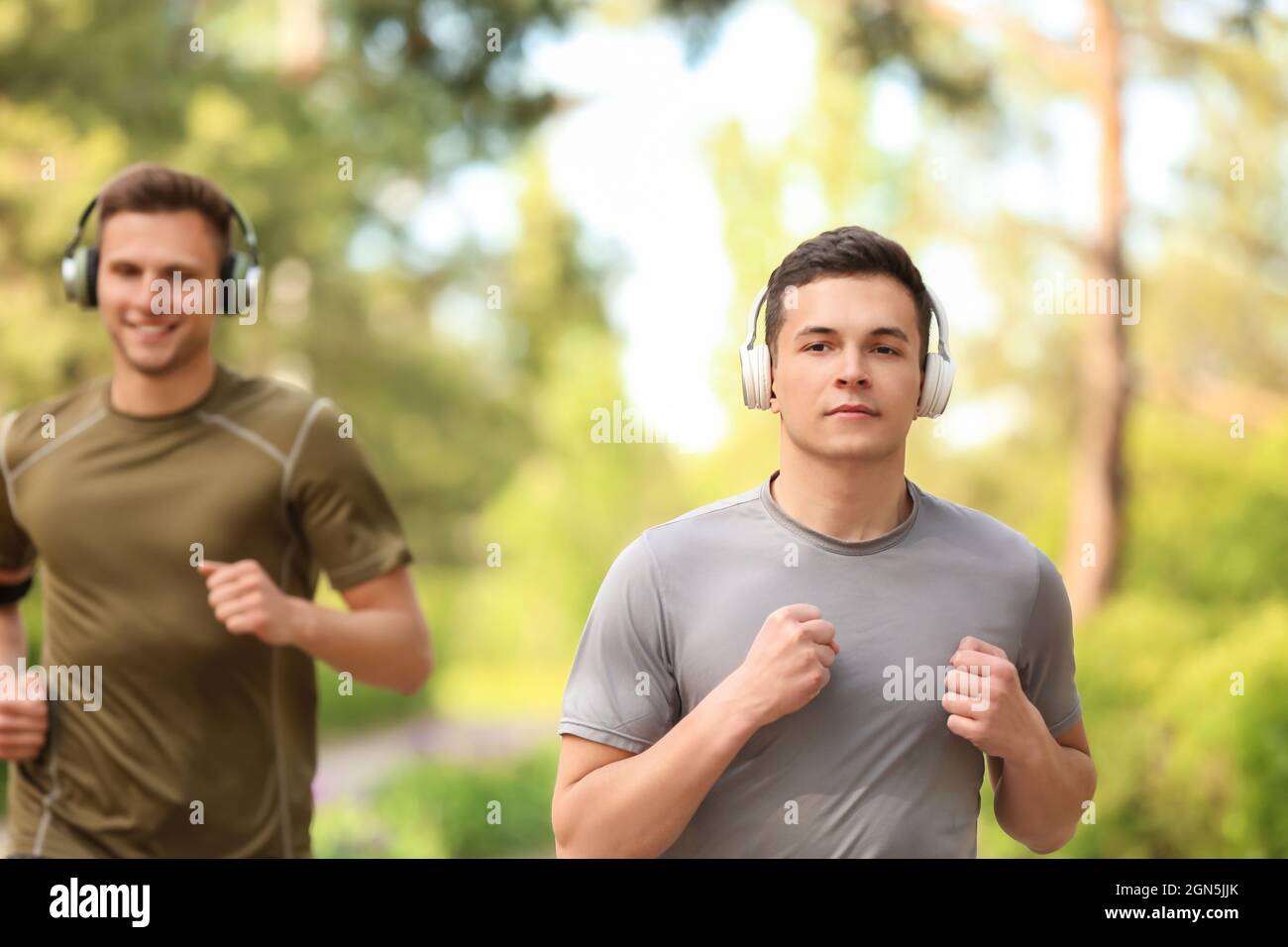 Sporty young men headphones hi-res stock photography and images - Alamy
