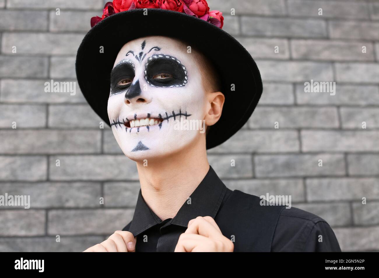 Young man with painted skull on his face outdoors. Celebration of Mexico's Day  of the Dead (El Dia de Muertos Stock Photo - Alamy