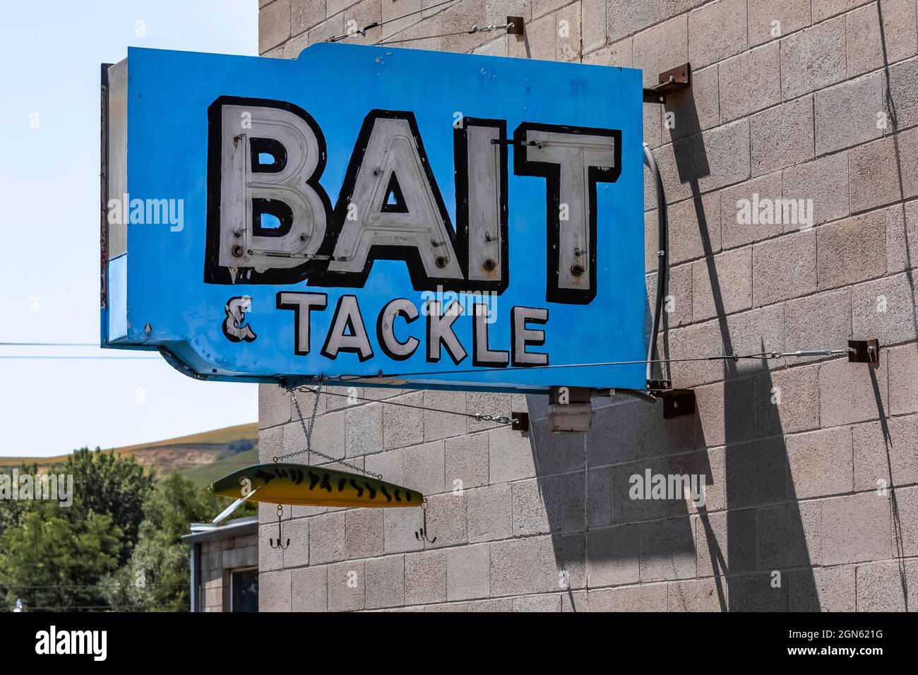 Old building with Bait & Tackle sign in an alley in Pomeroy, Washington State, USA [No property release; editorial licensing only] Stock Photo