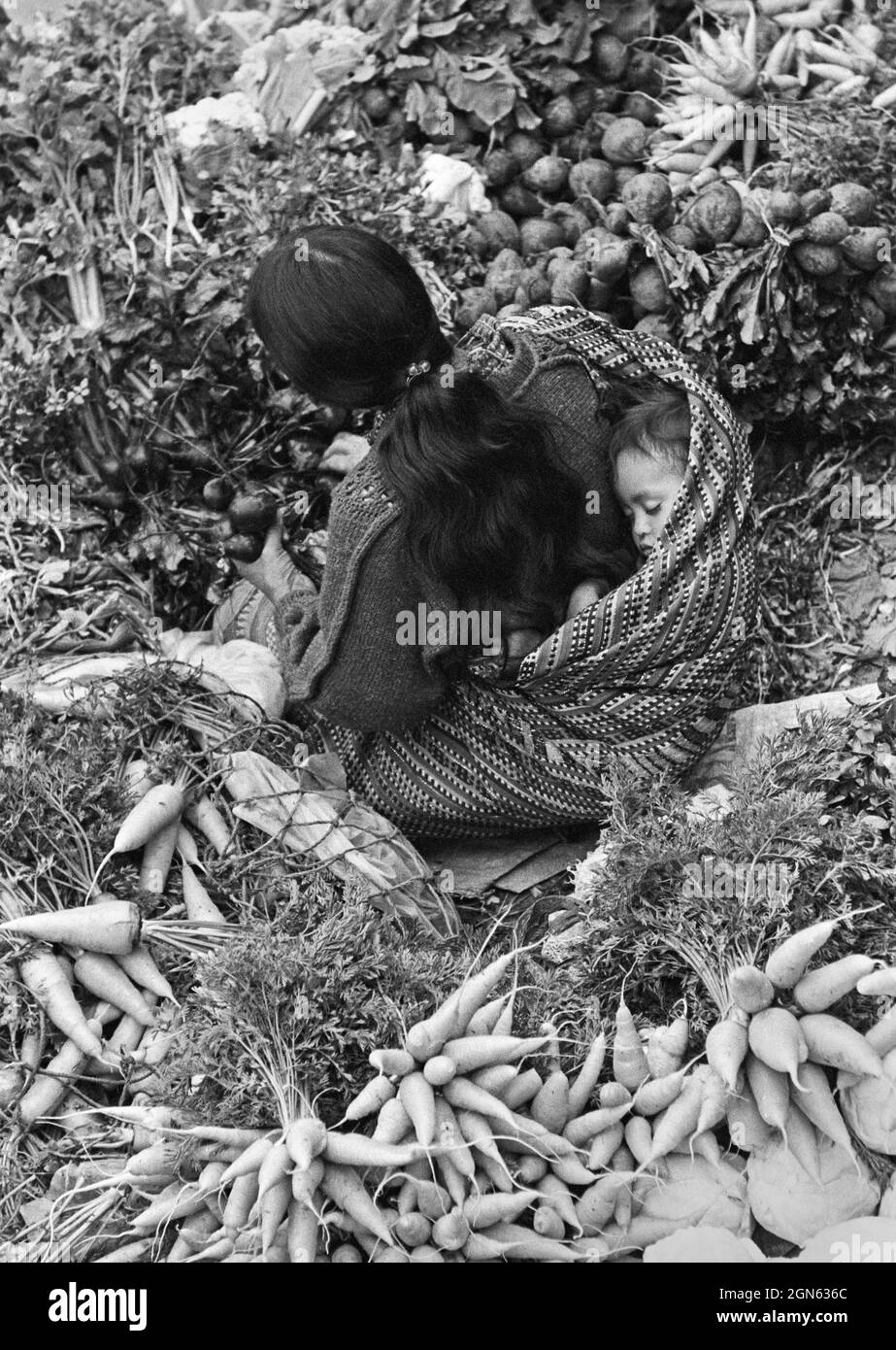 mother and child at market in Guatemala Stock Photo