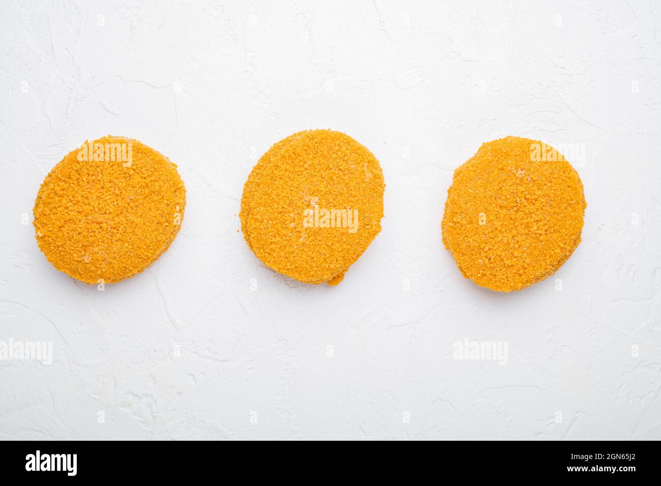 Raw fishcake Breaded set, on white stone table background, top view ...