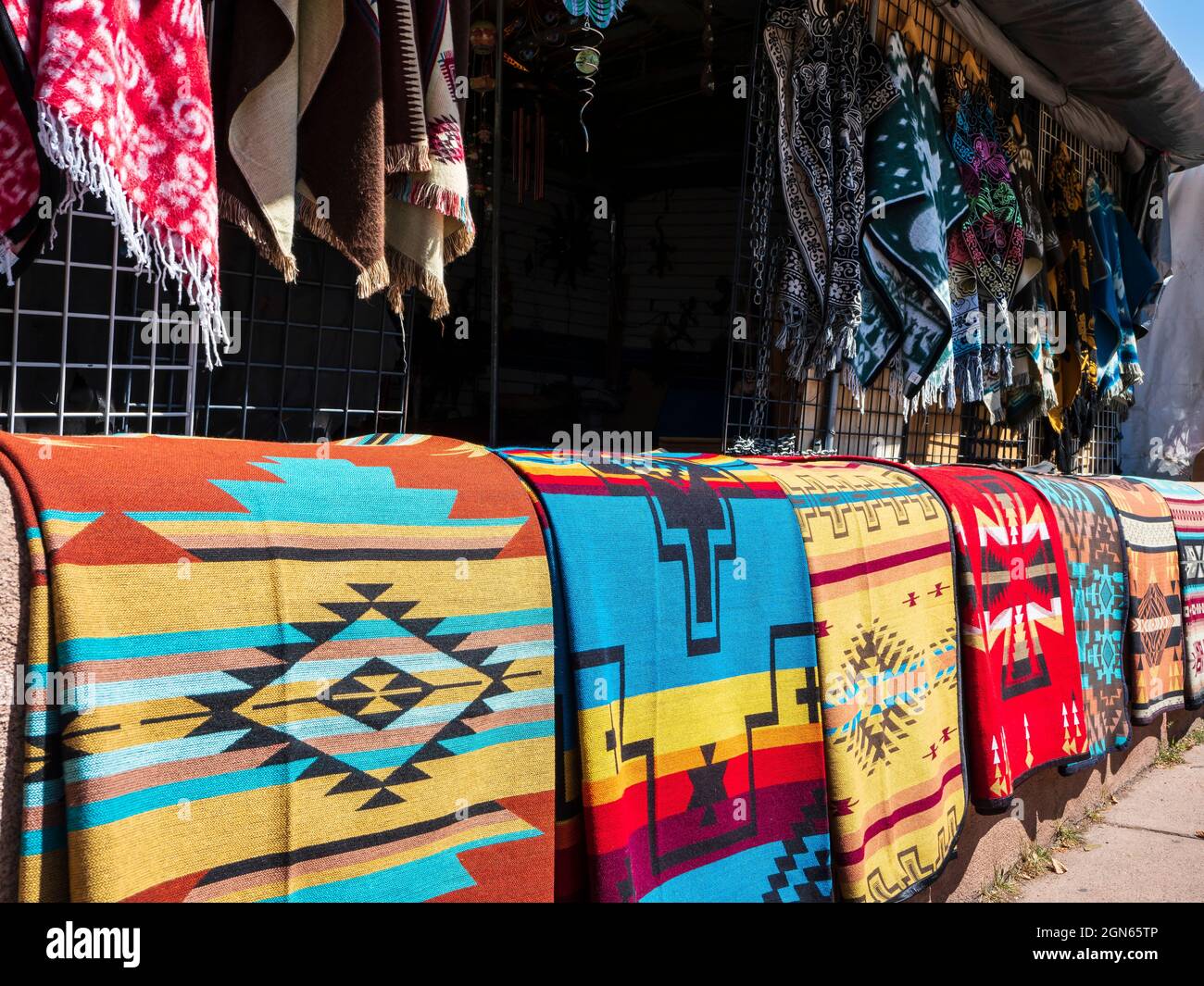 Blankets at a sidewalk vendor shop, downtown Santa Fe, New Mexico. Stock Photo