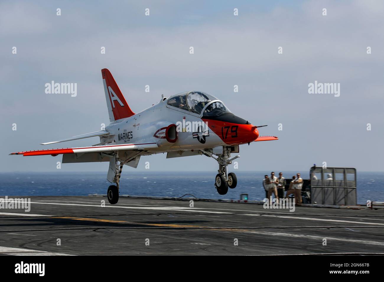 PACIFIC OCEAN (Aug. 29, 2021) A T-45C Goshawk, assigned to Training Air Wing 1 out of Naval Air Station Kingsville, Texas, performs a touch-and-go on the flight deck of the aircraft carrier USS Abraham Lincoln (CVN 72). Abraham Lincoln is underway conducting routine operations in the U.S. 3rd Fleet area of operations. (U.S. Navy photo by Mass Communication Specialist 3rd Class Michael Singley/Released) Stock Photo