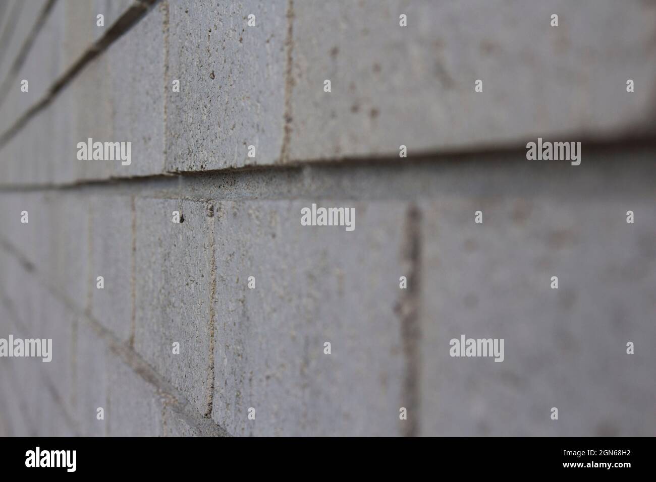 White brick wall with depth of field. Stock Photo