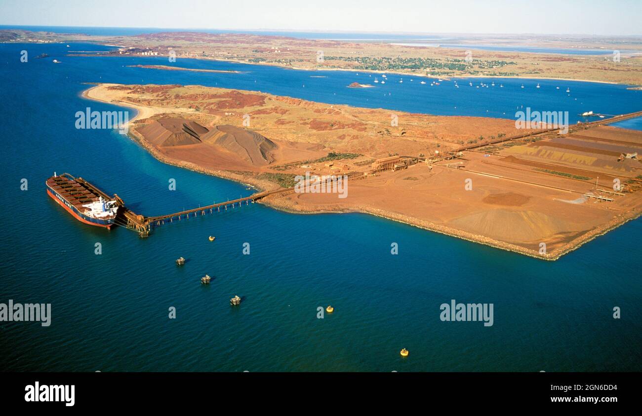 Loading iron ore at Dampier on the Western Australian coast Stock Photo