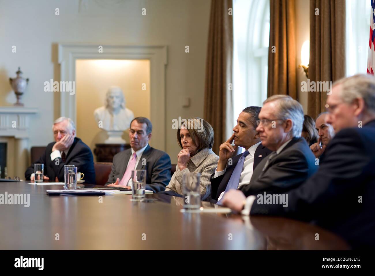 President Barack Obama meets with bipartisan leaders of the House and Senate, including from left, House Majority Leader Steny Hoyer (D-Md.), House Republican Leader John A. Boehner (R-Ohio), Speaker of the House Nancy Pelosi (D-Cal.), Senate Majority Leader Harry Reid (D-Nev.),  and Senate Republican Leader Mitch McConnell (R-Ky.) to discuss working together on issues surrounding the economy and jobs in the Cabinet Room of the White House, Feb. 10, 2010.  (Official White House Photo by Pete Souza) This official White House photograph is being made available only for publication by news organi Stock Photo