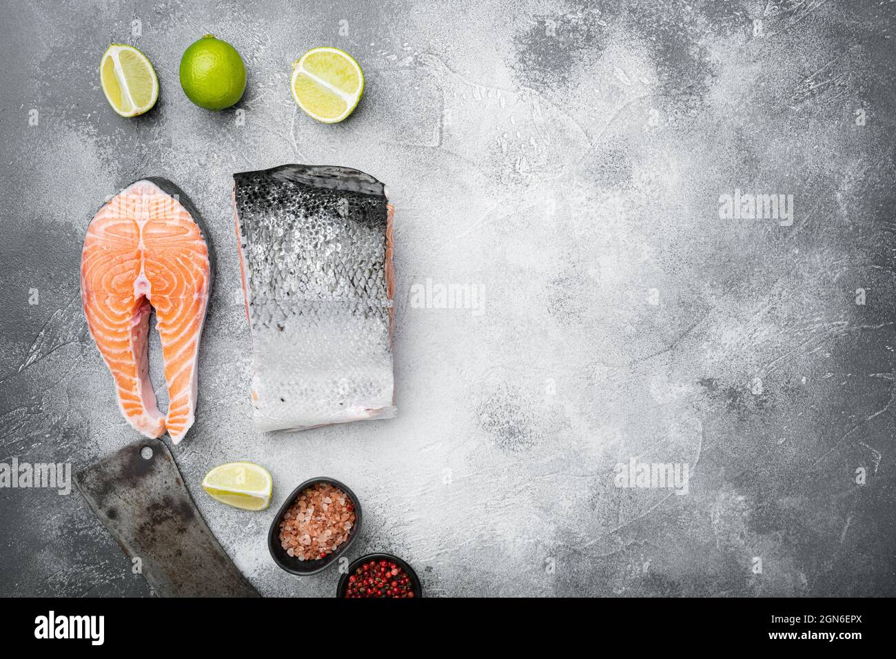 Big piece of Raw cut salmon fish set, on gray stone table background ...