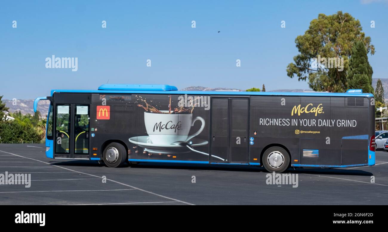 McDonalds McCafe advert on the side of a bus at Coral Bay, Paphos, Cyprus. Stock Photo