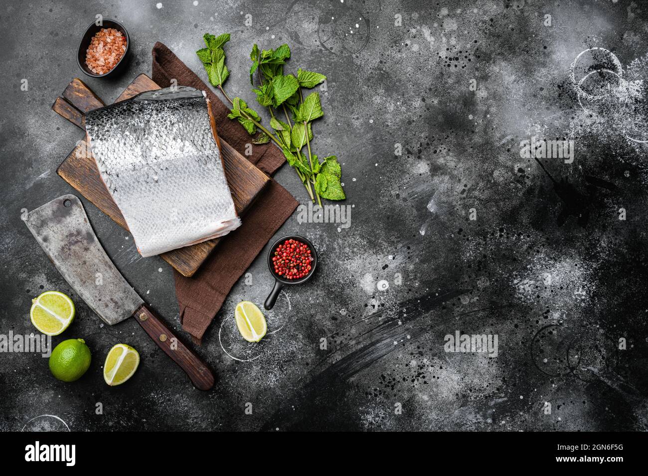 Salmon cut set, on black dark stone table background, top view flat lay ...