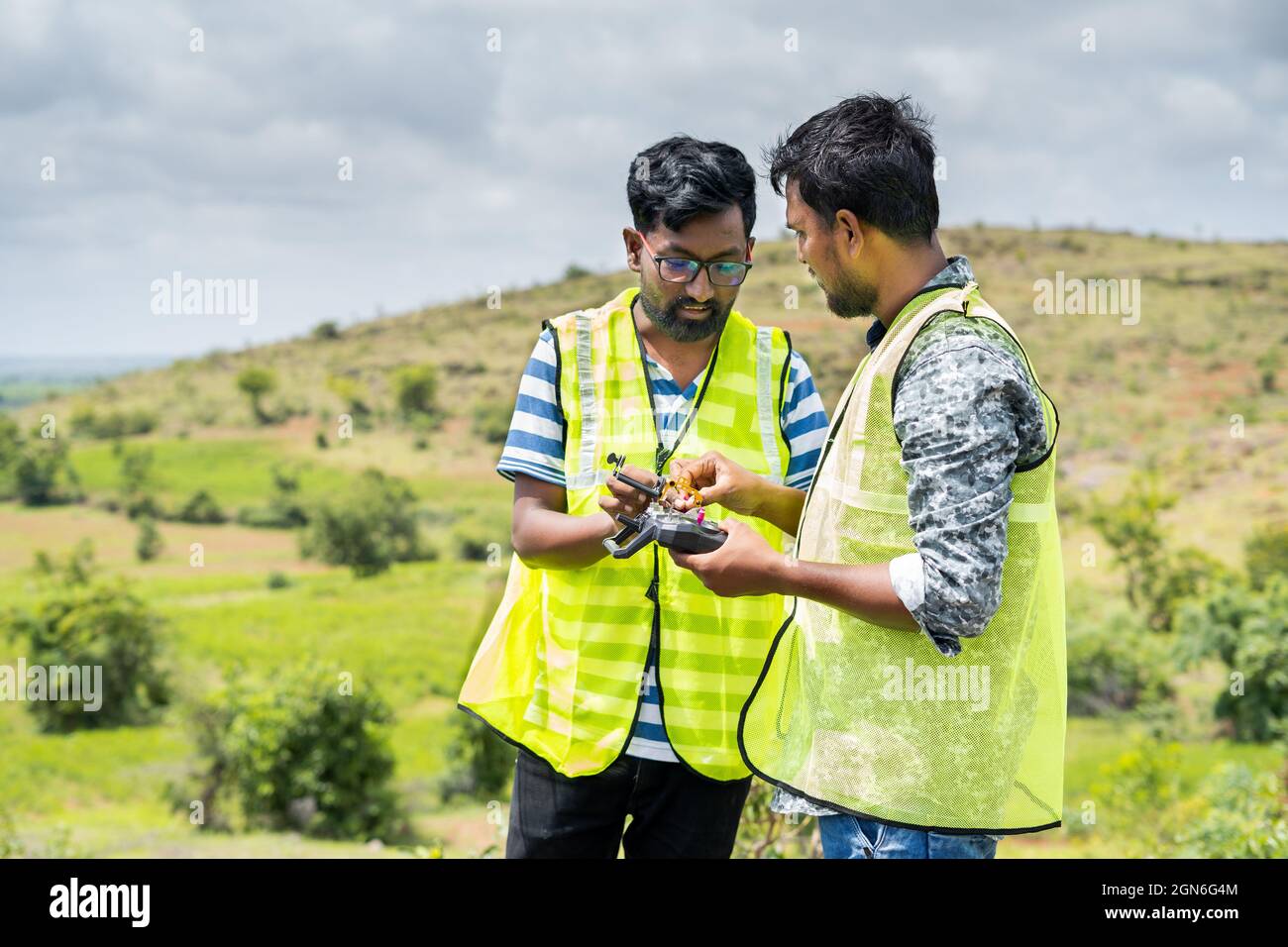 Trainer teaching by explaining about drone operations to student - Concept drone or UAV pilot training. Stock Photo