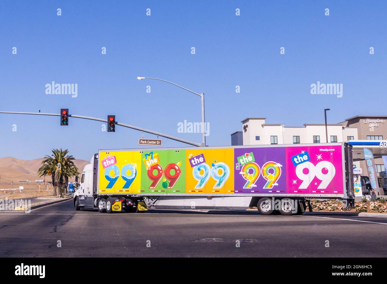 A 99 cent only store truck leaves the warehouse district in Patterson  California USA in the Central Valley Stock Photo - Alamy
