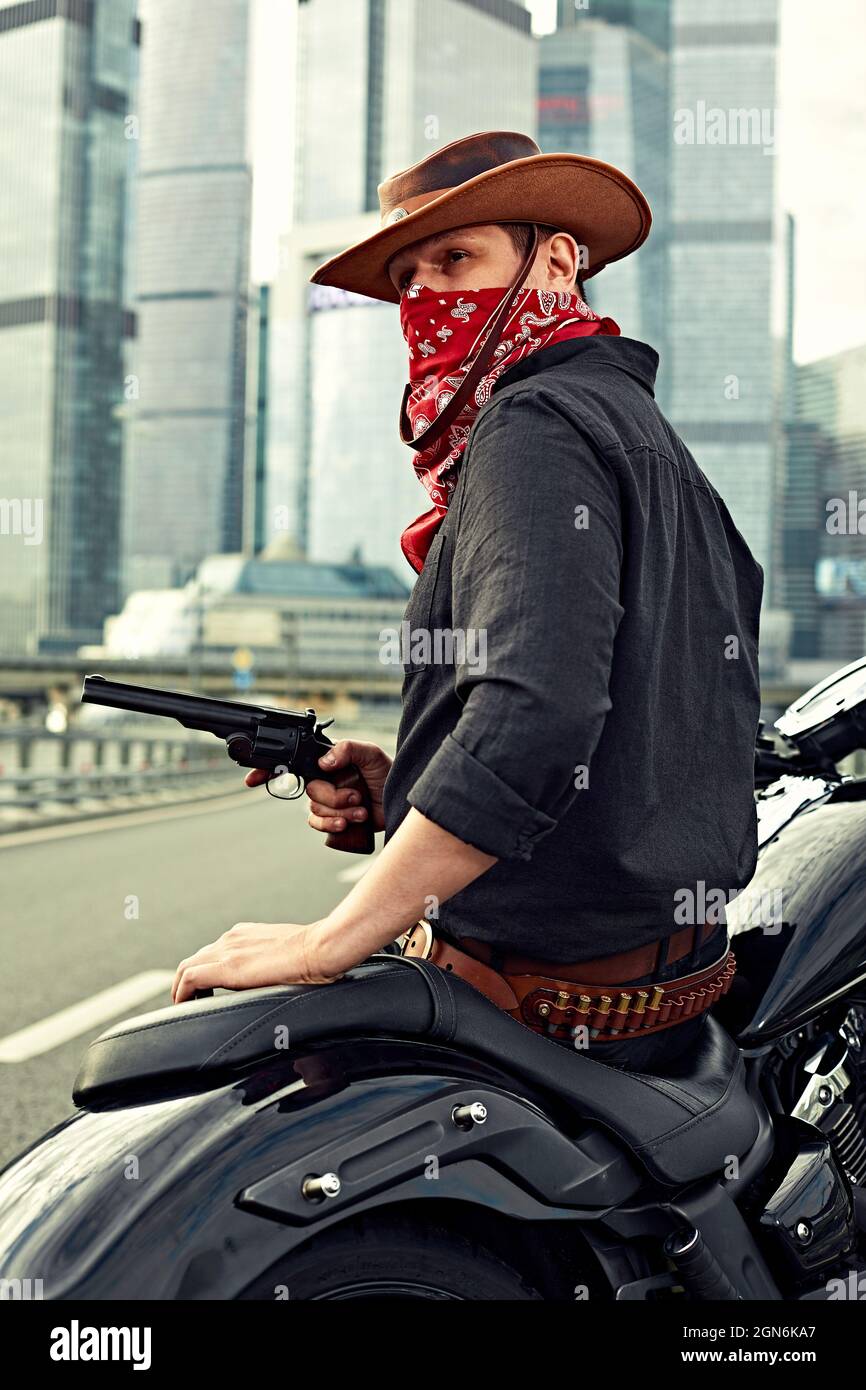 Portrait of stylish male dressed in a black leather jacket and