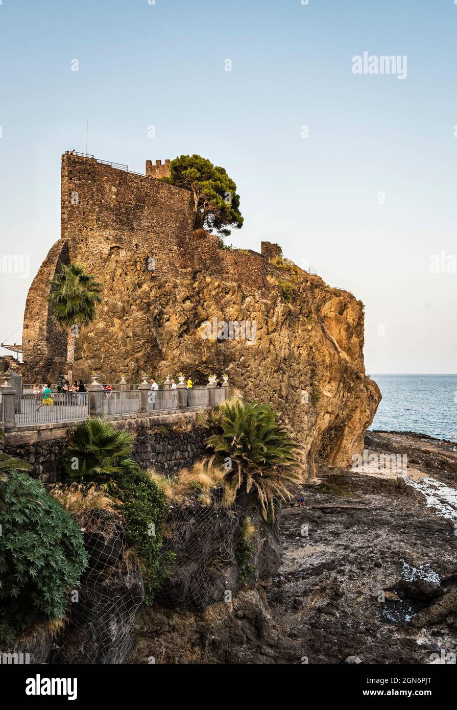 The Norman castle (1076) in Aci Castello, Catania, Sicily, Italy. It stands on a high basalt (lava) outcrop and is based on a 7c Byzantine fortress Stock Photo