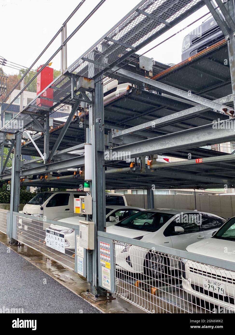 Tokyo, Japan - 23 November 2019: Two Storey Street Parking for Cars in Tokyo Stock Photo