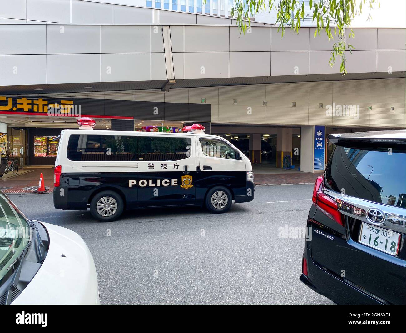 Tokyo, Japan - 19 November 2019: Japanese police van rushing through the street in Tokyo Stock Photo