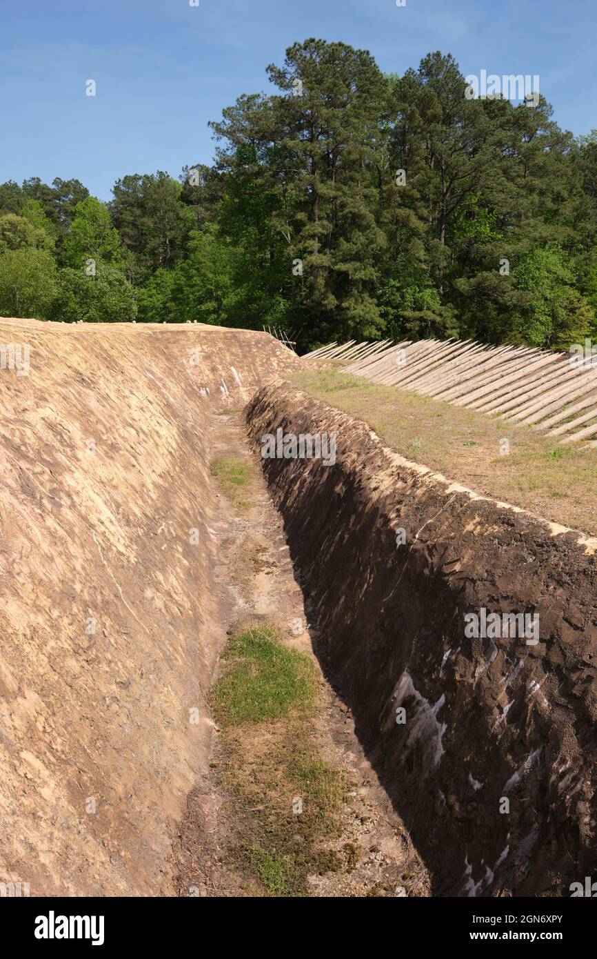 Trench, ditch with sharpened inclined log fraise defense. At the Pamplin Historical Park & The National Civil War Museum of the Civil War Soldier in P Stock Photo