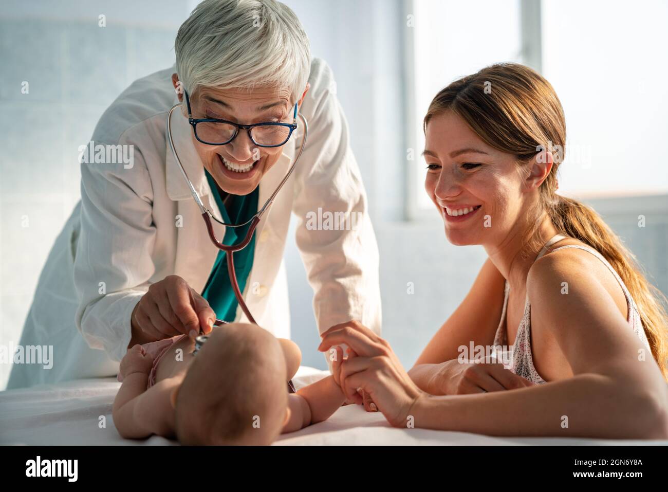 Pediatric doctor exams little baby. Health care, medical examination ...