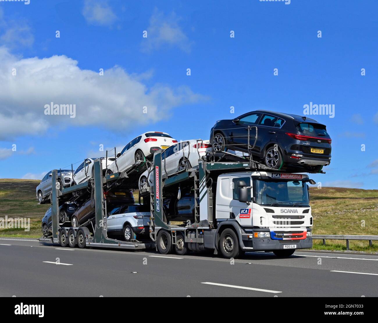 Car Transporter. BCA Automotive Limited. M6 Motorway, Southbound. Shap, Cumbria, England, United Kingdom, Europe. Stock Photo