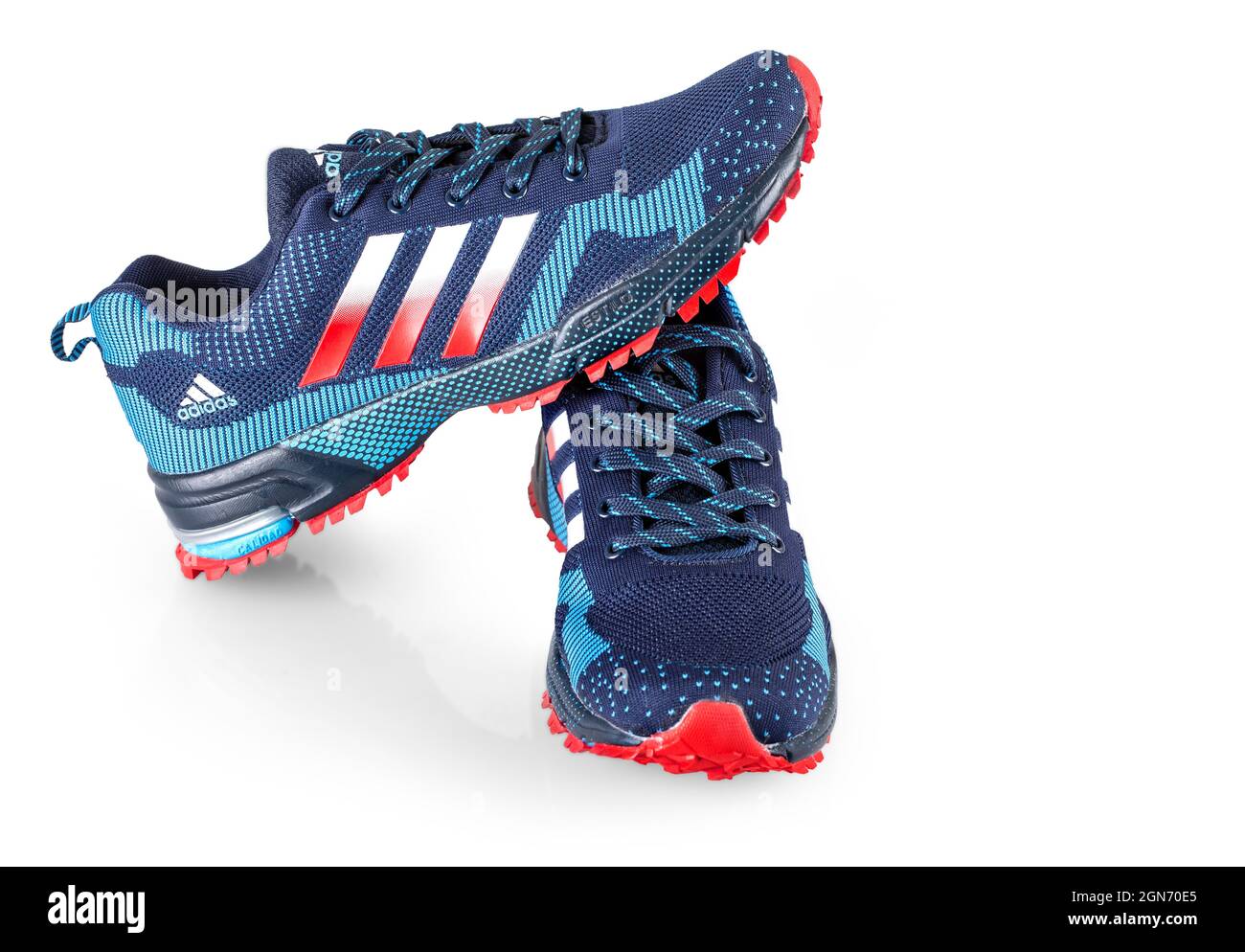 Blue Adidas Running Sneakers. Adidas, Germany company. Isolated on white  Stock Photo - Alamy