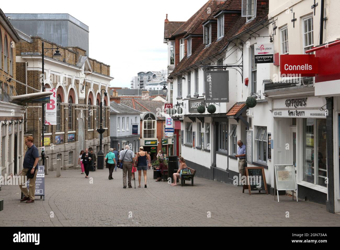 Shoppers walk down Wote Street in Basingstoke in Hampshire, UK Stock Photo