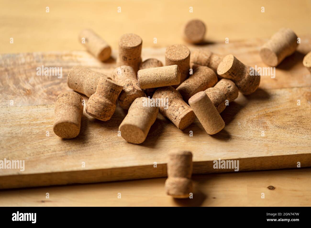 Bunch of wine corks on wooden table Stock Photo