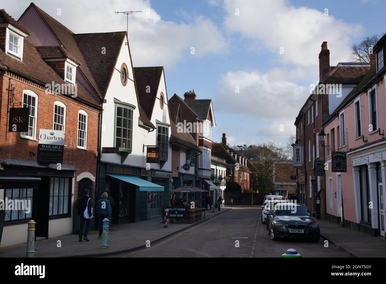 Retail outlets, with pedestrians on a sunny winter's day in Winchester