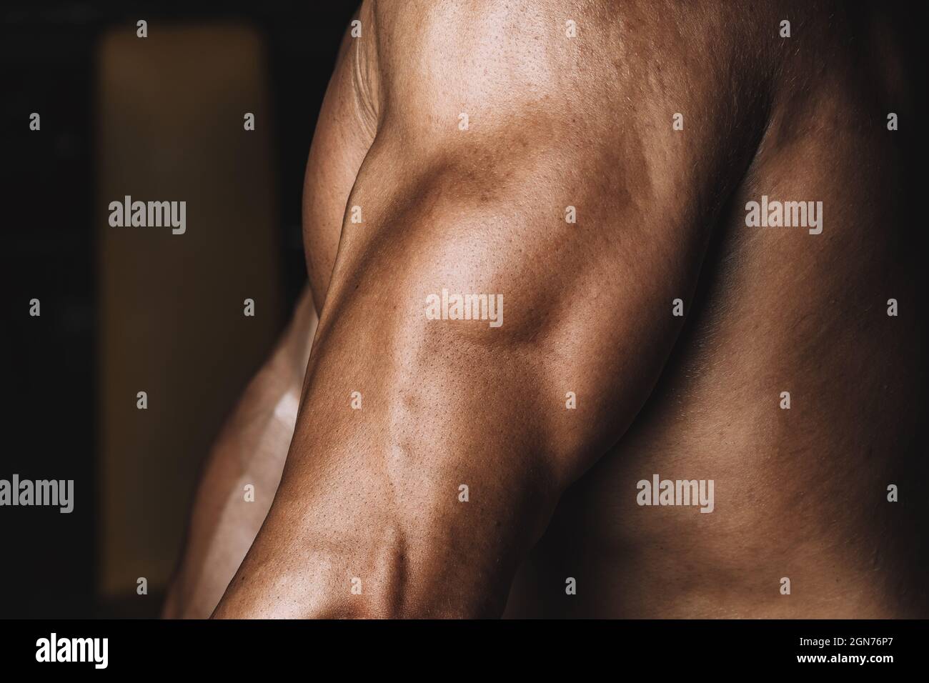 Sweat arm of a strong caucasian man Stock Photo