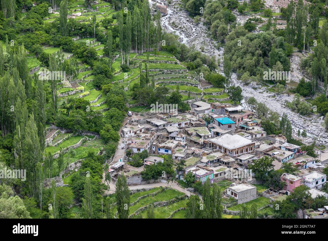 Village Green gardens in mountain valley Pakistan aerial view Stock Photo