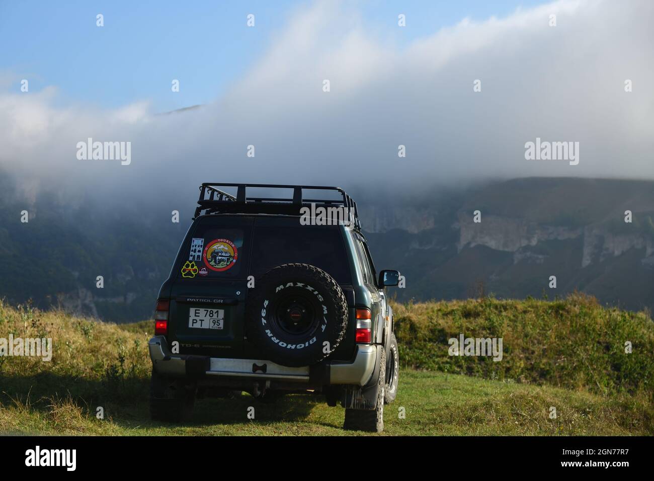 Chechnya, Russia - Sept 12, 2021: Off-road car shown in the Caucasus mountains. Vedeno district of the Chechen Republic. Extreme mountain safari is on Stock Photo
