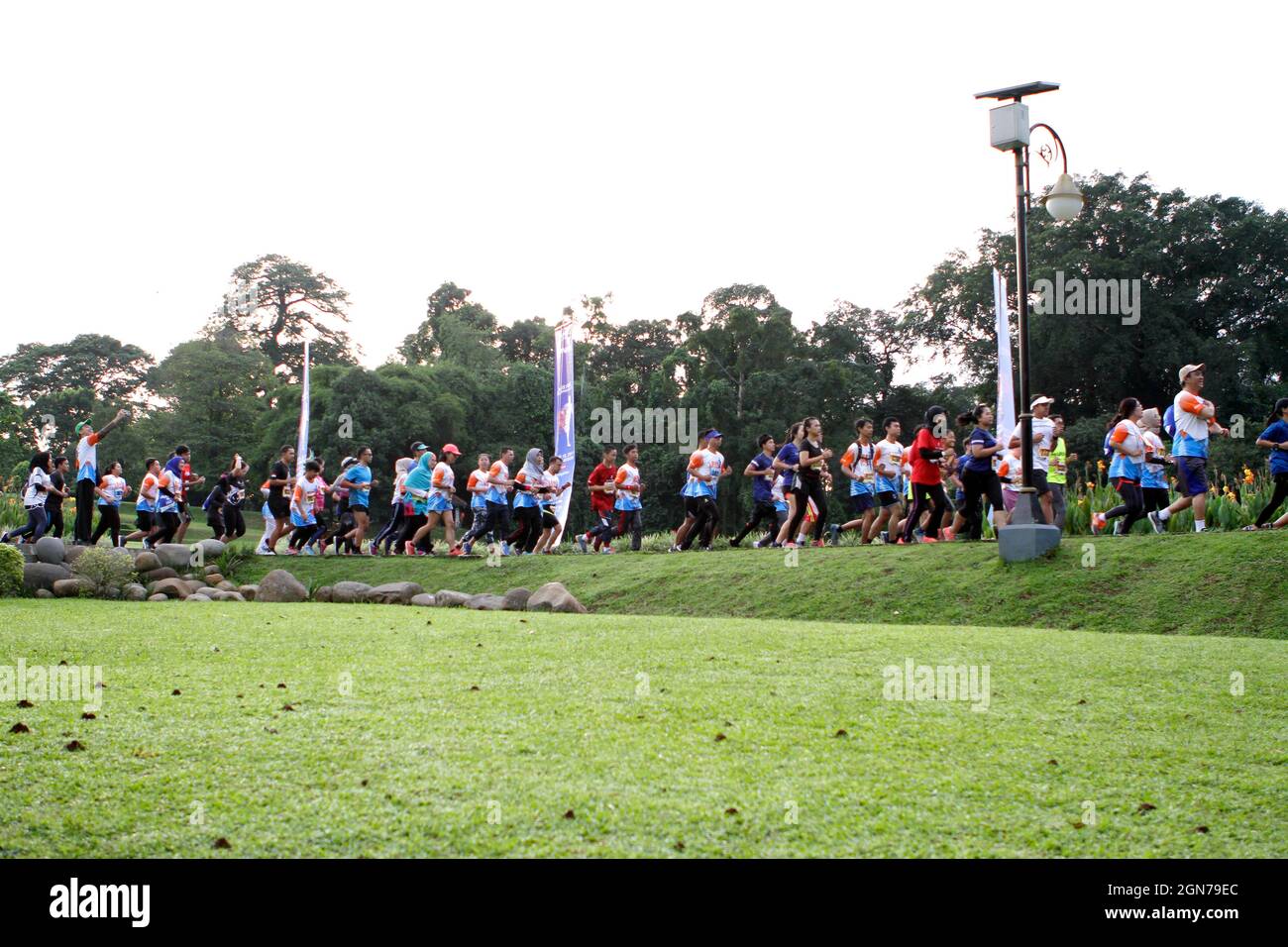 a photo of a marathon running competition held by one of the Indonesian government banks. Stock Photo