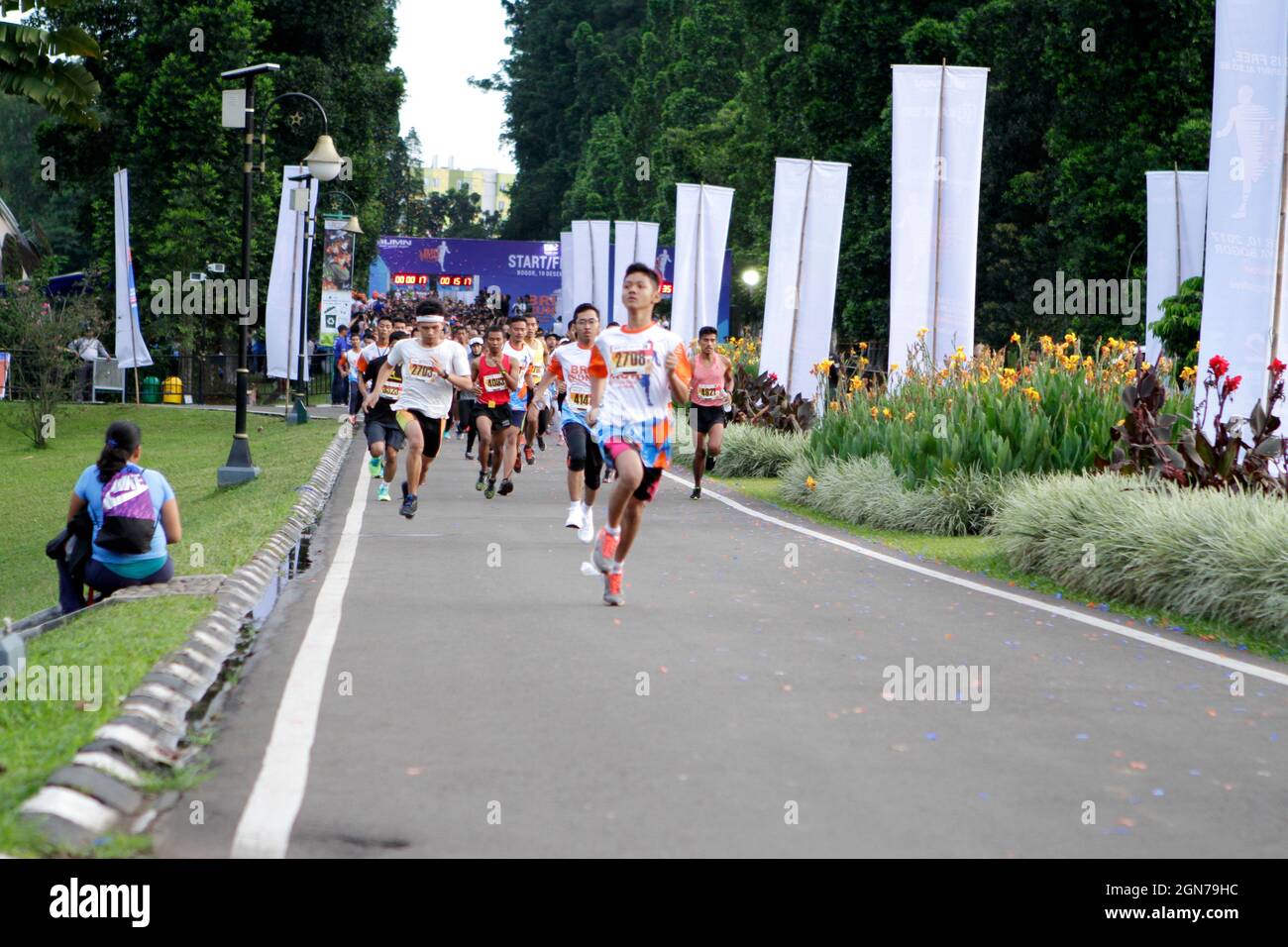 a photo of a marathon running competition held by one of the Indonesian government banks. Stock Photo