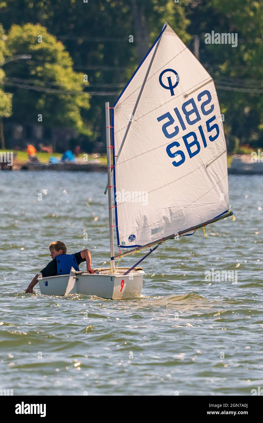 The sail training foundation holds youth sail training classes Fridays from May through October, in the channel between Lake Michigan and Green Bay. Stock Photo