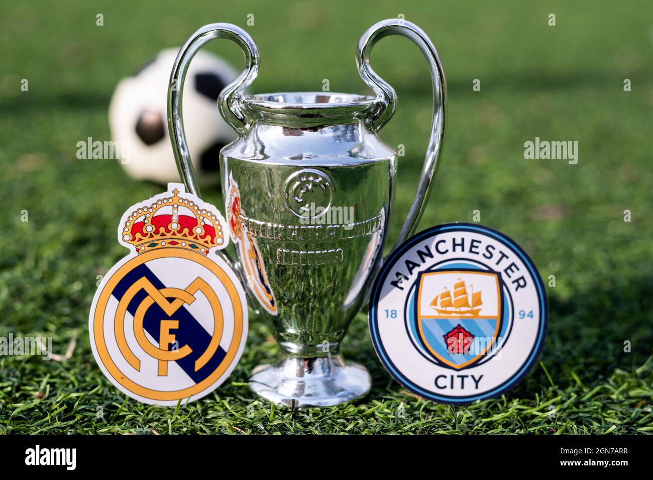 April 16 21 Moscow Russia The Uefa Champions League Cup And The Emblems Of The Football Clubs Manchester City F C And Real Madrid Cf On The Gre Stock Photo Alamy