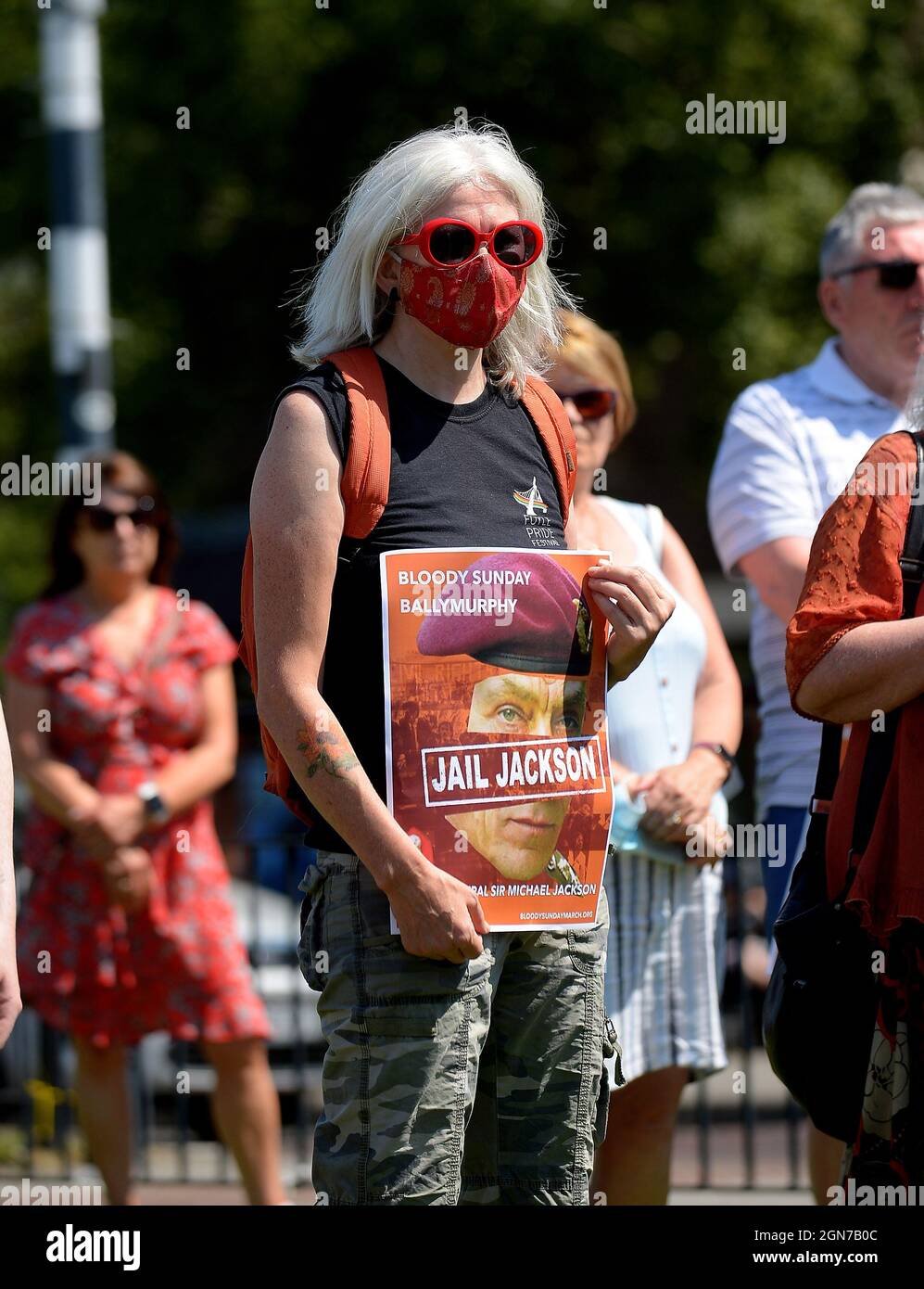 Protester opposed to British government’s proposed State Amnesty with a banner at a rally in the Bogside in Derry, Londonderry Northern Ireland. ©George Sweeney / Alamy Stock Photo Stock Photo