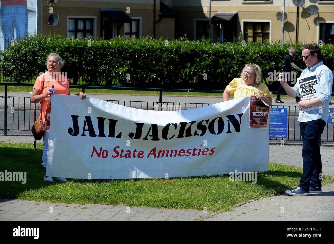 Protesters opposed to British government’s proposed State Amnesty with a banner at a rally in the Bogside in Derry, Londonderry Northern Ireland. ©George Sweeney / Alamy Stock Photo Stock Photo