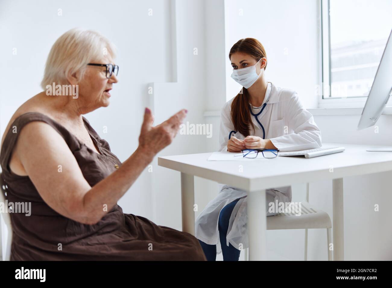 Old woman patient communicates hi-res stock photography and images - Alamy