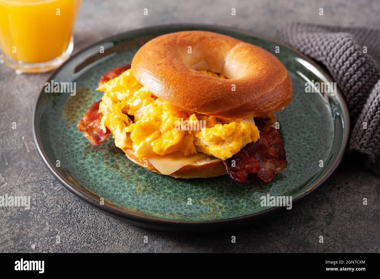 breakfast egg and bacon sandwich on bagel with cheese Stock Photo - Alamy