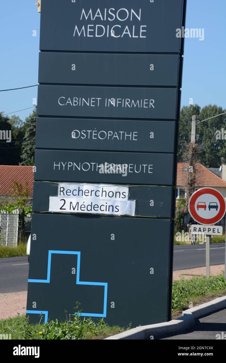 sign of a medical house looking for doctors at the entry of rural village in Auvergne-Rhone-Alpes region, Puy-de-Dome, France Stock Photo