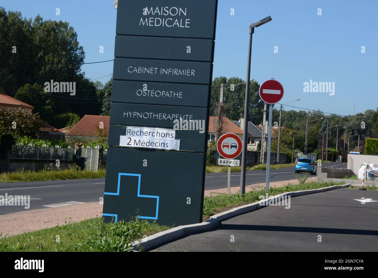 sign of a medical house looking for doctors at the entry of rural village in Auvergne-Rhone-Alpes region, Puy-de-Dome, France Stock Photo