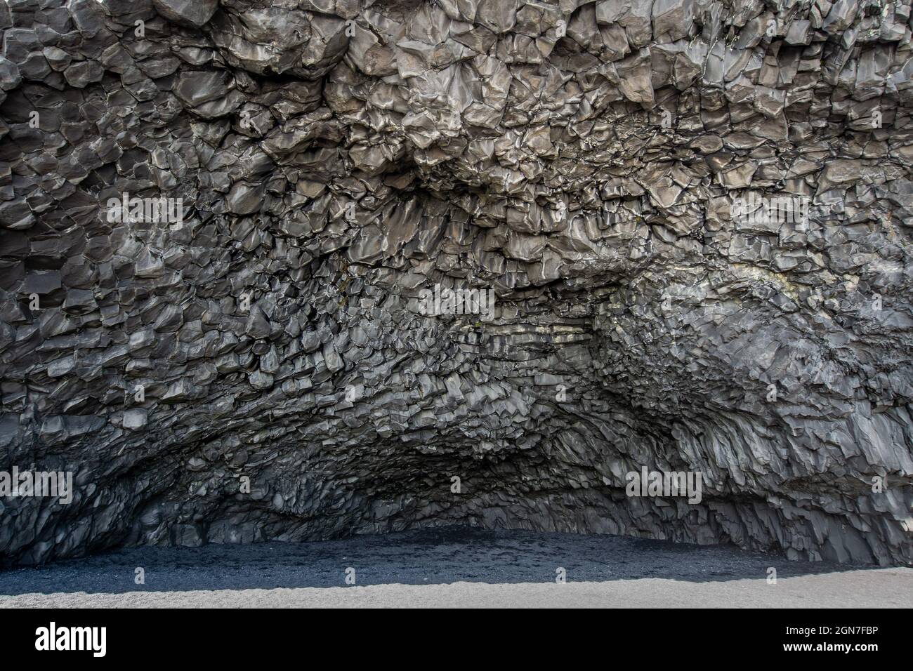Basalt rock cave on Reynisfjara beach in Iceland Stock Photo