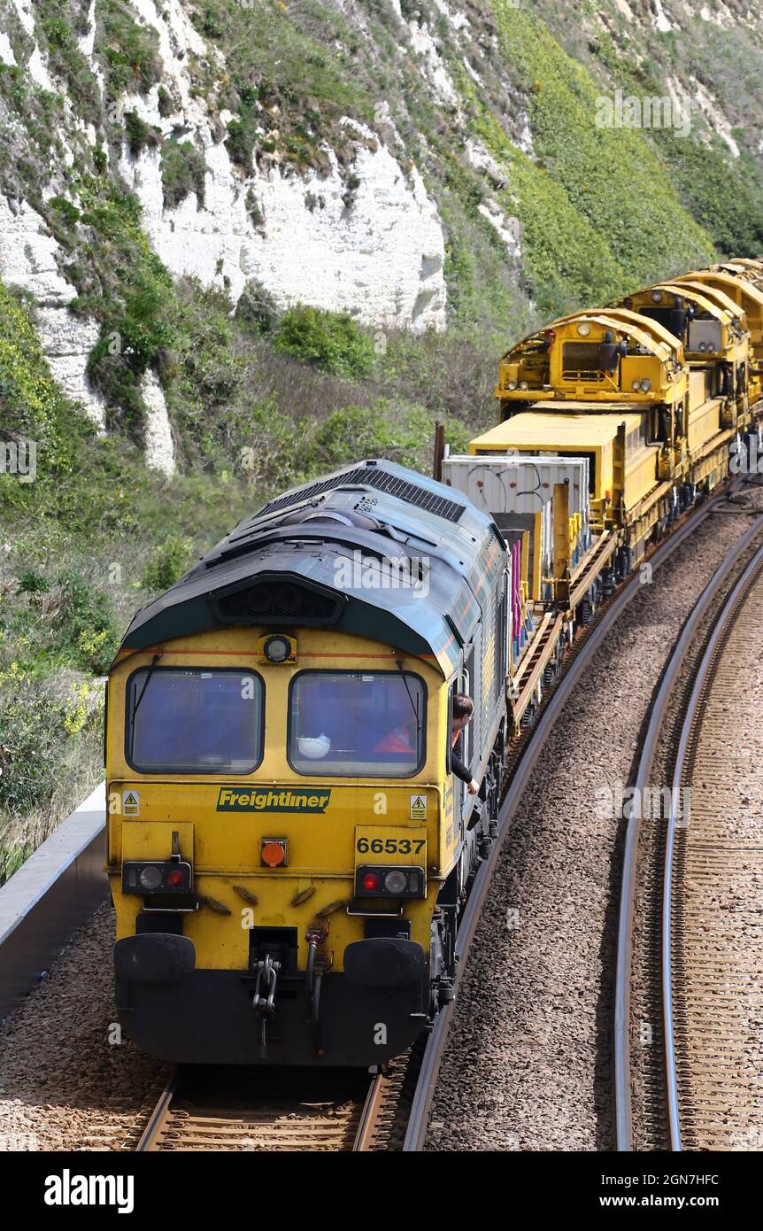 File photo dated 26/04/19 of a Freightliner freight train. The rail industry is claiming a surge in the movement of goods by train shows it can help ensure supermarket shelves remain stocked during the lorry driver shortage. Office of Rail and Road (ORR) figures show the volume of rail freight between April and June was up 36.5% compared with the same period last year, and was 1.3% higher than the same quarter in 2019. The overall increase in the volume of rail freight between April and June was driven by increased demand for aggregates such as crushed rock, sand and gravel being used to build Stock Photo