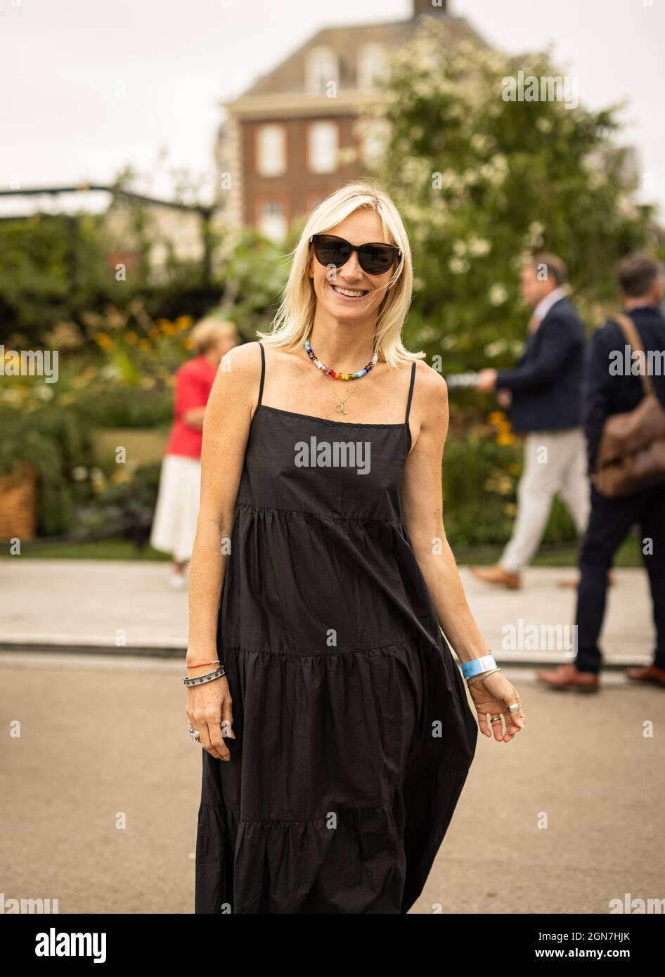 RHS Chelsea Flower Show 2021. Jo Whiley visits the show happy wearing a