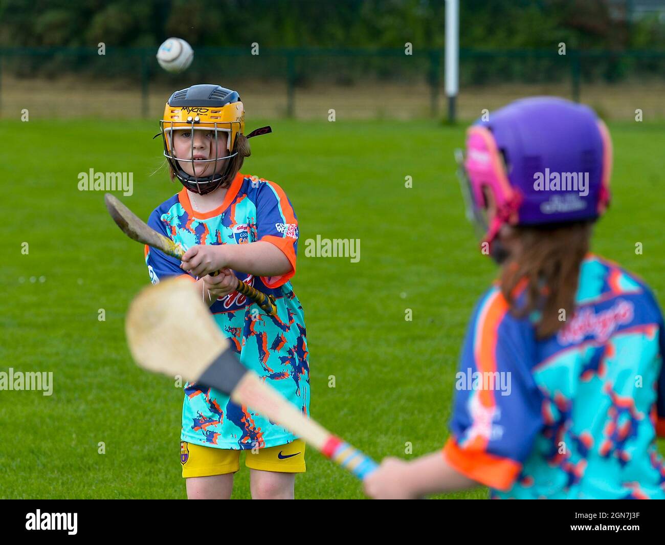 Young girls at GAA hurling Cul camp in Derry, Northern Ireland. ©George Sweeney / Alamy Stock Photo Stock Photo