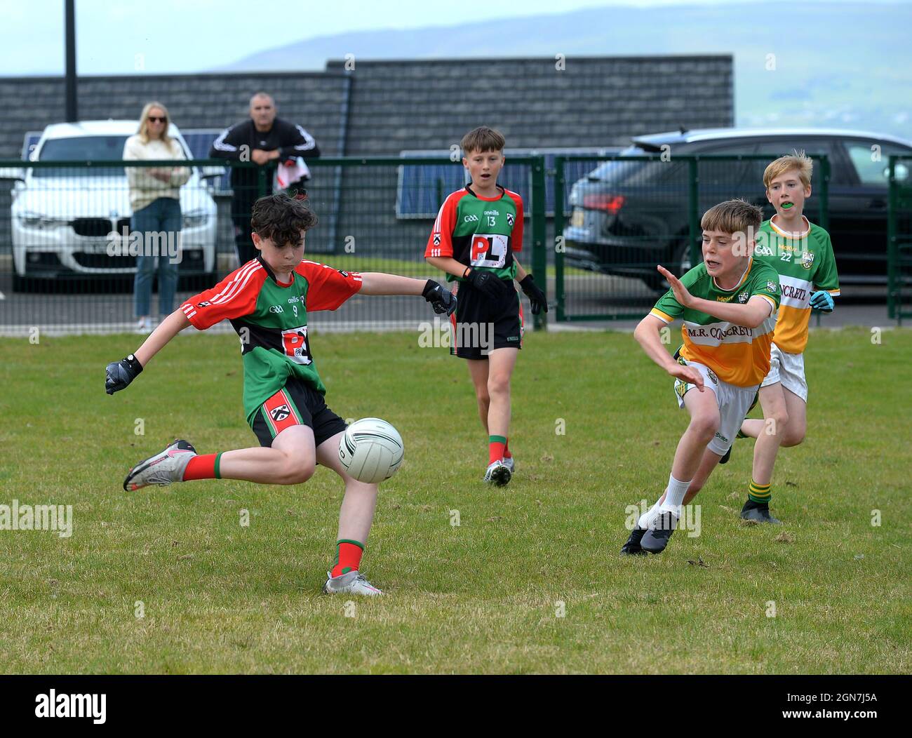 School boys play in Derry GAA club football competition in Derry, Northern Ireland. ©George Sweeney / Alamy Stock Photo Stock Photo