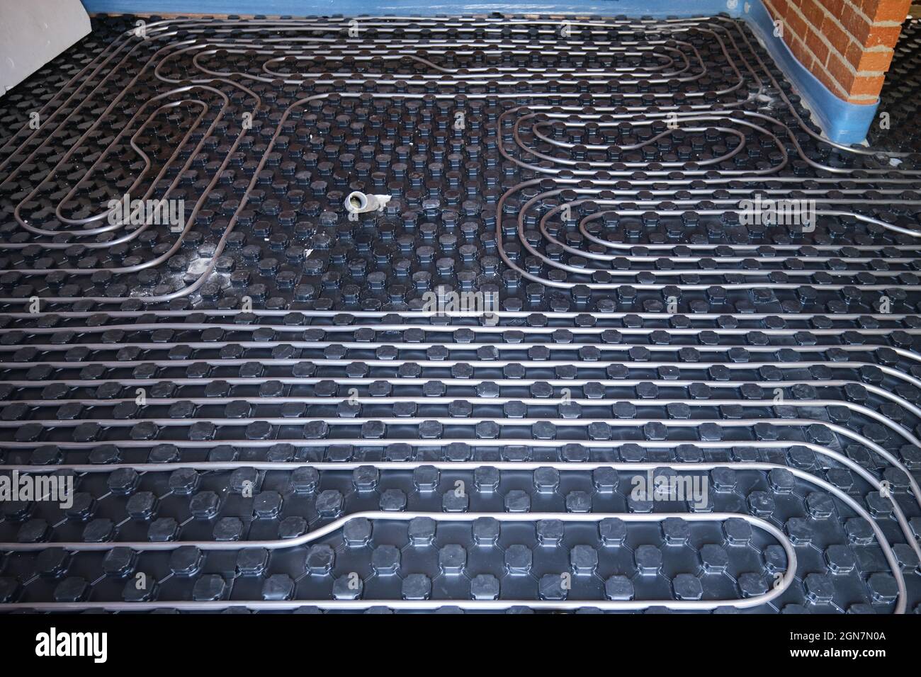 Radiant floor heating and cooling installation on insulation boards Stock Photo Alamy