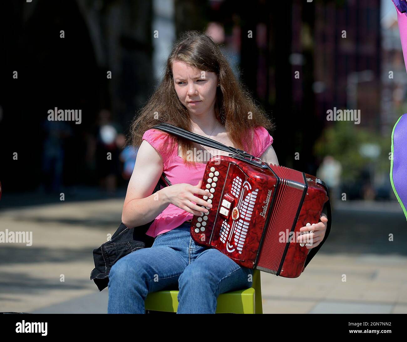 Irish musician playing traditional music in Guildhall Square, Derry, Northern Ireland 2021. ©George Sweeney / Alamy Stock Photo Stock Photo