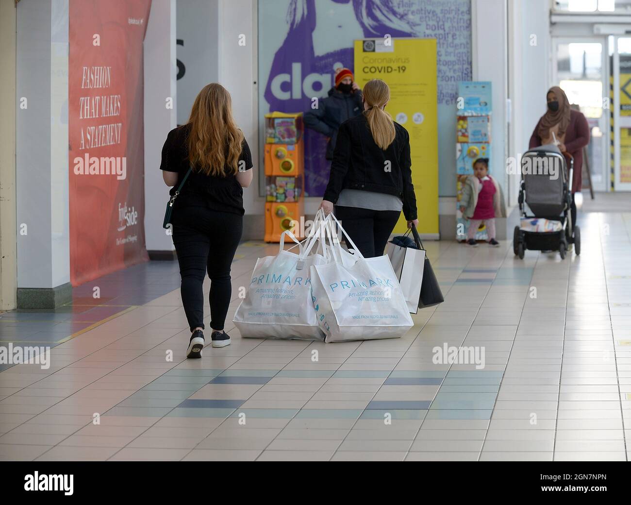 Shoppers with Primark bags in Derry, Londonderry, Northern Ireland. ©George Sweeney / Alamy Stock Photo Stock Photo